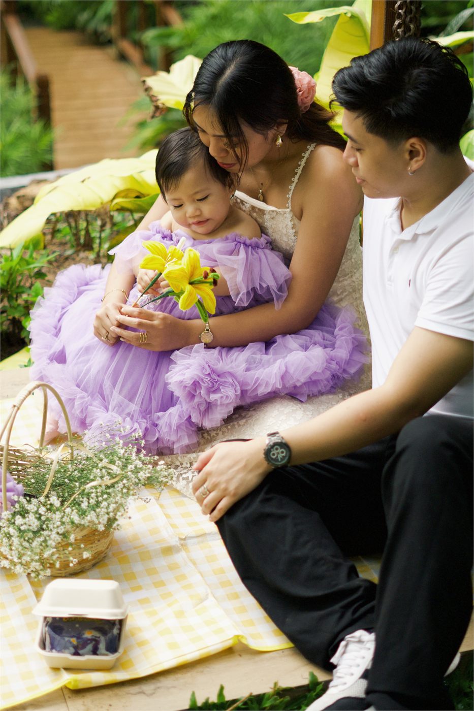 Giana with her parents at the picnic table